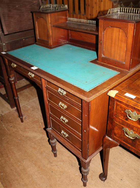 An Edwardian walnut desk, Straughan & Co, W.100cms